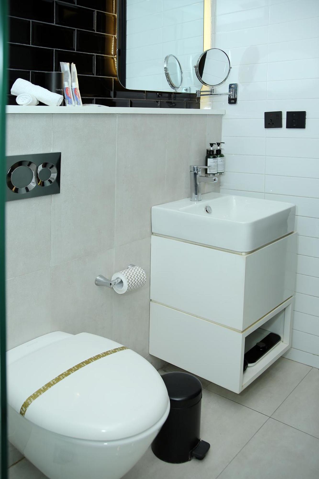 Ambiance Boutique Art Hotel Lahore Quarto foto A modern bathroom