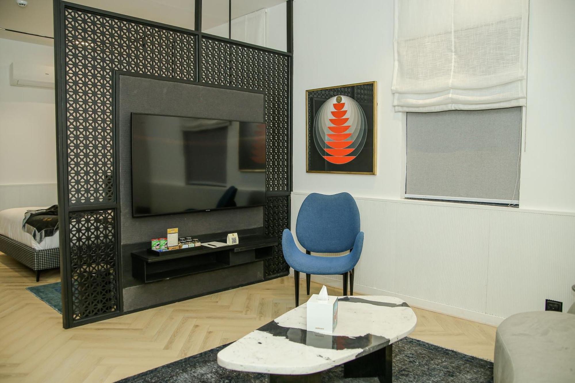 Ambiance Boutique Art Hotel Lahore Quarto foto A room divider